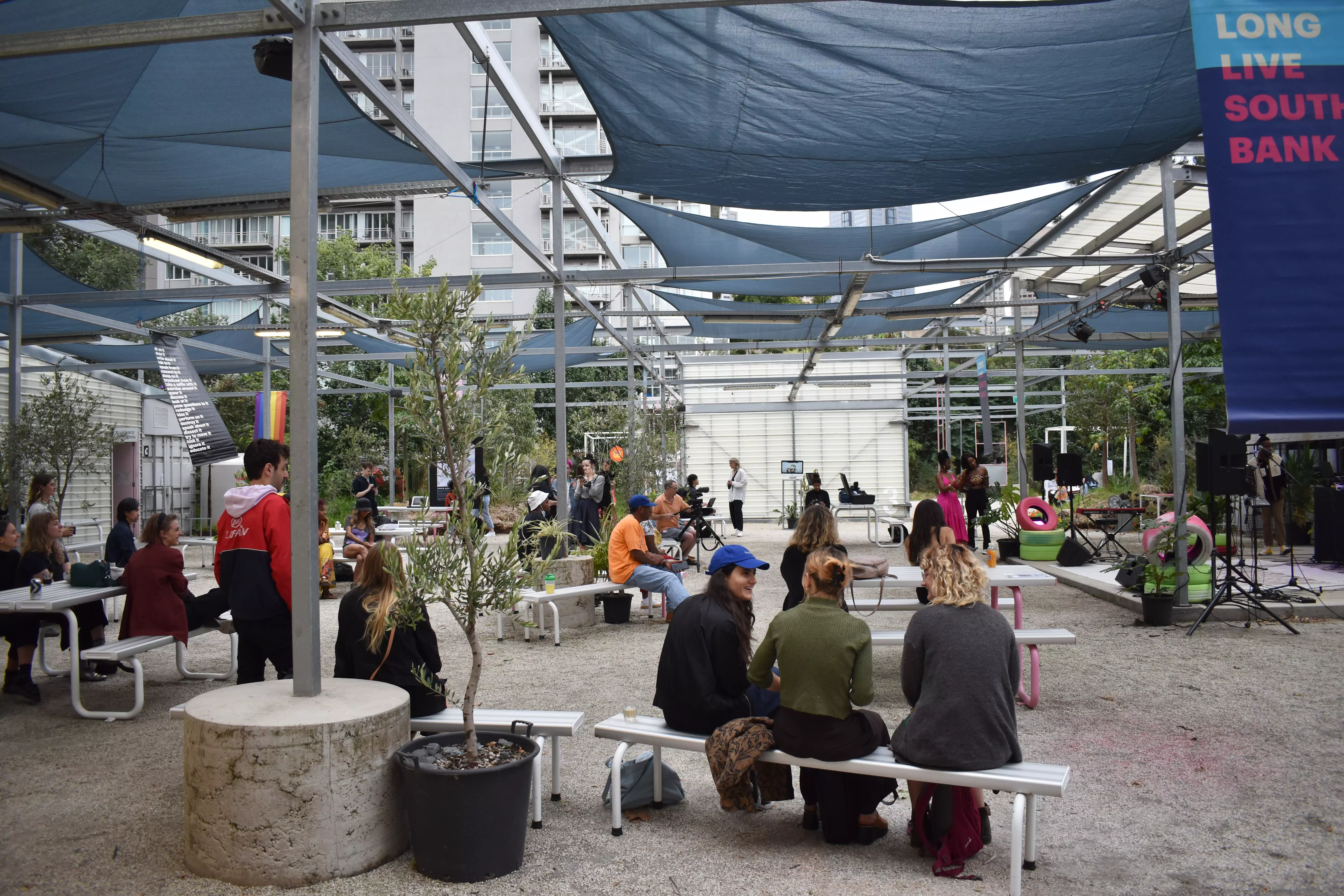 People seated at the outdoor space at Testing Grounds in Southbank.